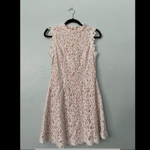 White lace sleeveless dress.